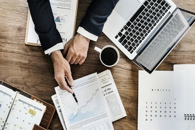 businessman, laptop, stocks, stock exchange, broker, chart, reports, accounting records, calculations, notebook, flat lay, broker, broker, broker, broker, broker. Accounting services compared: bookkeeping, compliance packages, online accountants and outsourced finance